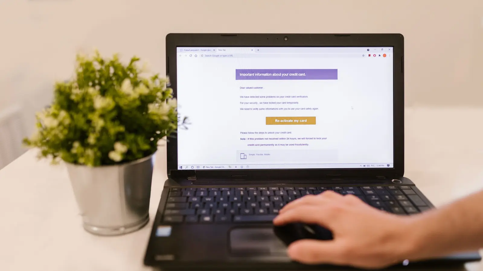 A person reading an email on a laptop
