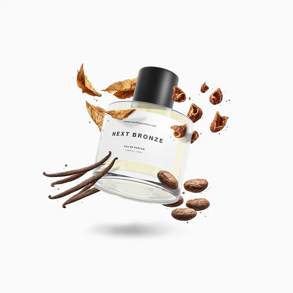 Next Bronze bottle floating with vanilla pods, cacao and dried tobacco leaf